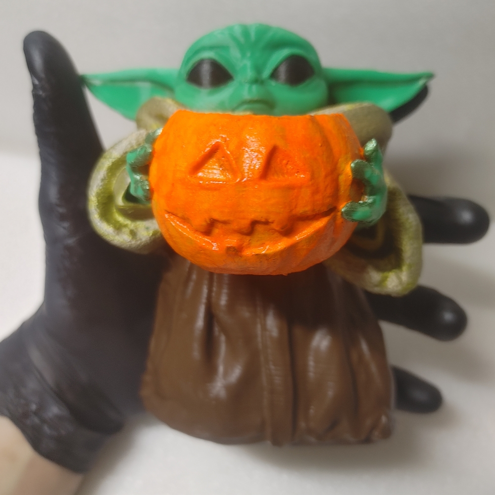Green Baby Yoda Figurine Holding Orange Pumpkin - Picture 9 of 9